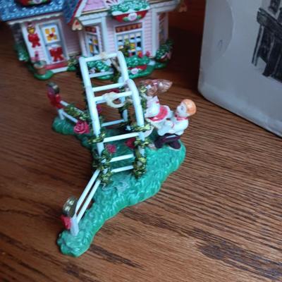 2 DEPARTMENT 56 CHRISTMAS BUILDINGS AND 1 OTHER BUILDING