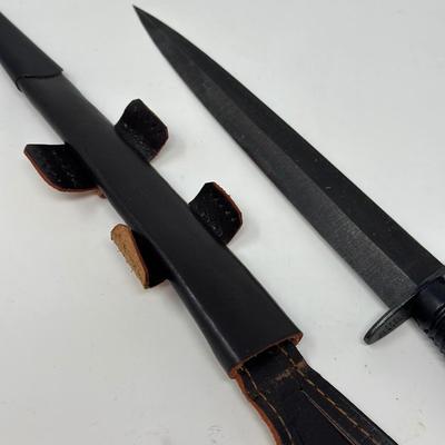 Sale Photo Thumbnail #15: 8” blackened high carbon blade with alloy handle and leather scabbard
This double-edged, well-balanced dagger was the preferred commando weapon during WWII for both the US and British forces. This is a 3rd Pattern Fairbairn-Sykes fighting knife manufact