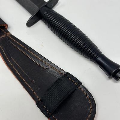 Sale Photo Thumbnail #14: 8” blackened high carbon blade with alloy handle and leather scabbard
This double-edged, well-balanced dagger was the preferred commando weapon during WWII for both the US and British forces. This is a 3rd Pattern Fairbairn-Sykes fighting knife manufact