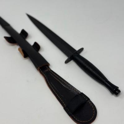 Sale Photo Thumbnail #16: 8” blackened high carbon blade with alloy handle and leather scabbard
This double-edged, well-balanced dagger was the preferred commando weapon during WWII for both the US and British forces. This is a 3rd Pattern Fairbairn-Sykes fighting knife manufact