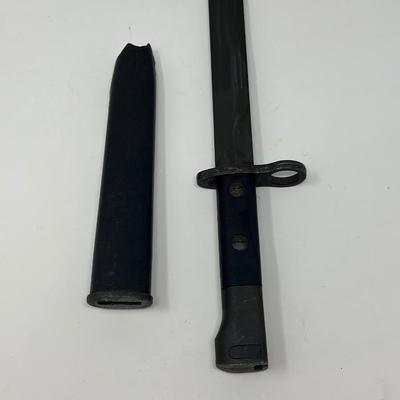 Sale Photo Thumbnail #39: New bayonet from action arms in the 80's IMI IDF. Top of scabbard is broken. See pictures