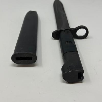 Sale Photo Thumbnail #40: New bayonet from action arms in the 80's IMI IDF. Top of scabbard is broken. See pictures