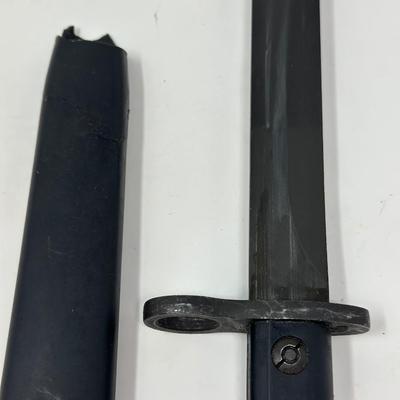 Sale Photo Thumbnail #37: New bayonet from action arms in the 80's IMI IDF. Top of scabbard is broken. See pictures
