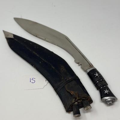 Sale Photo Thumbnail #58: Made in India. The blade is carbon steel and measures 11.06” long by 14.62” overall
The Gurkha Kukri was commonly used as a weapon or in ceremonies. The blade features a cut-out right below the grip. It is said that it resembles Shiva, a cow's foot as