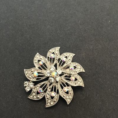 Sale Photo Thumbnail #11: Beautiful Silvertone brooch with AB rhinestones. Please see attached photos.