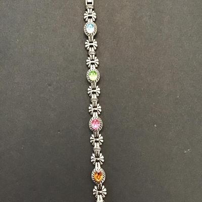 Sale Photo Thumbnail #28: Beautiful Silvertone bracelet with multicolor rhinestones. Please see attached photos.