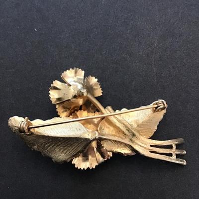 Sale Photo Thumbnail #46: Very nice vintage, gold tone, flower brooch. Please see attached photos.