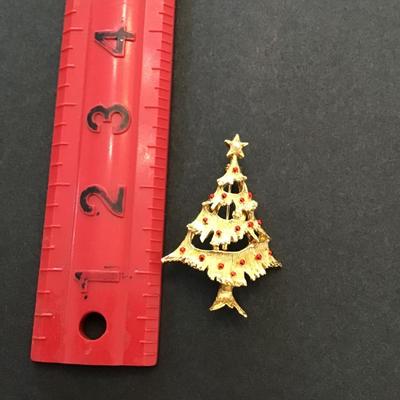 Sale Photo Thumbnail #51: Very nice vintage Gerrys gold tone Christmas brooch. Please see attached photos.
