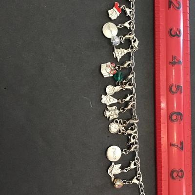 Sale Photo Thumbnail #71: Vintage Silvertone Christmas charm bracelet. Please see attached photos.