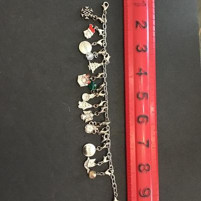Sale Photo Thumbnail #72: Vintage Silvertone Christmas charm bracelet. Please see attached photos.