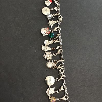 Sale Photo Thumbnail #73: Vintage Silvertone Christmas charm bracelet. Please see attached photos.