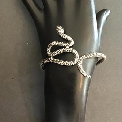 Sale Photo Thumbnail #83: Silvertone vintage, hinged snake bracelet. Please see attached photos.
