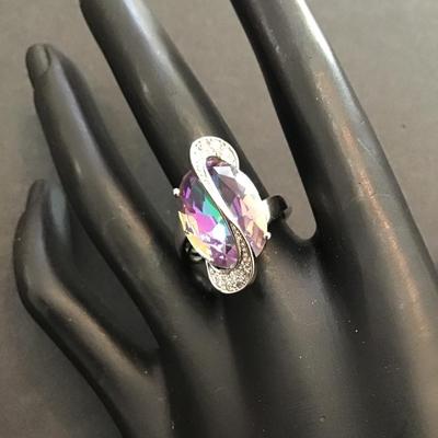 Beautiful SilverTone fashion statement ring with purple rhinestone
