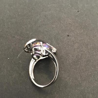 Beautiful SilverTone fashion statement ring with purple rhinestone