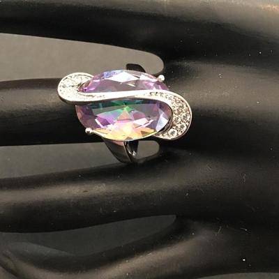 Beautiful SilverTone fashion statement ring with purple rhinestone