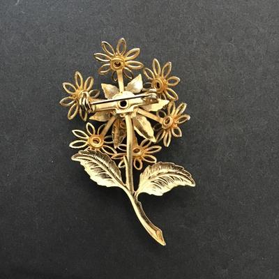 Beautiful, vintage, gold tone , flower, brooch, with red rhinestones