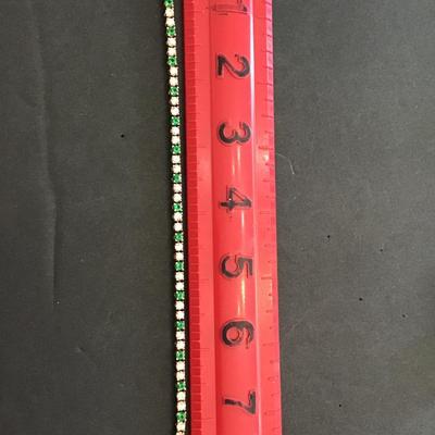 Beautiful, gold tone, tennis bracelet with multicolored rhinestones