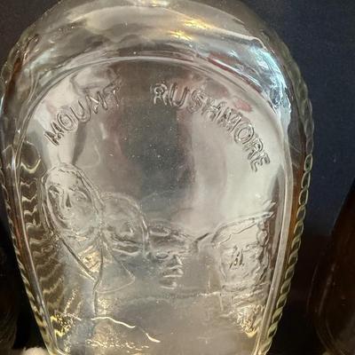 Vintage Mrs Butterworth glass bottles and Mt Rushmore glass bottle
