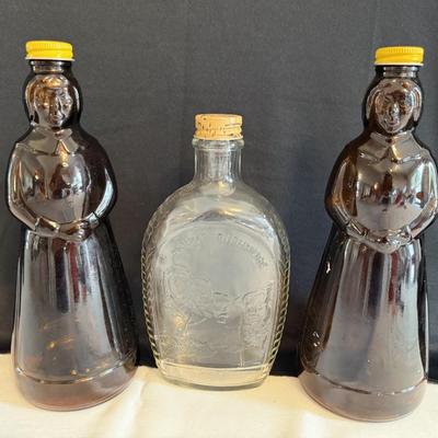 Vintage Mrs Butterworth glass bottles and Mt Rushmore glass bottle