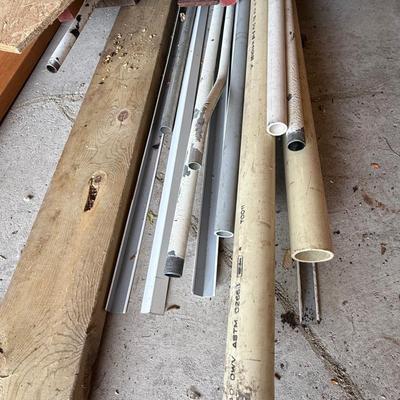 Pile of wood, pvc, pipes