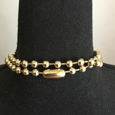 Vintage metal gold toned beaded necklace, long excellent condition very cool