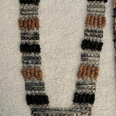 THREE NECKLACES AND A BRACELET
