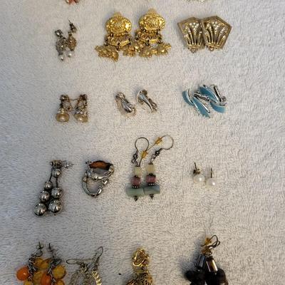 AN ASSORTMENT OF EARRINGS