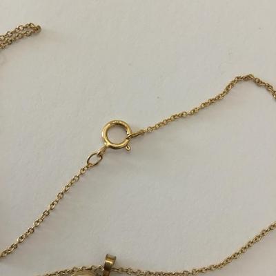 Dainty vintage gold filled rocket heart locket necklace