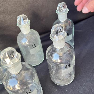 Sale Photo Thumbnail #908: 9 bottles, numbered.  Very good shape!