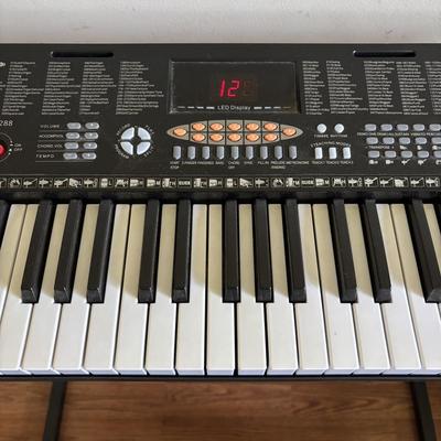 LOT 93: Zeny 61-Key Electronic Keyboard YM-288