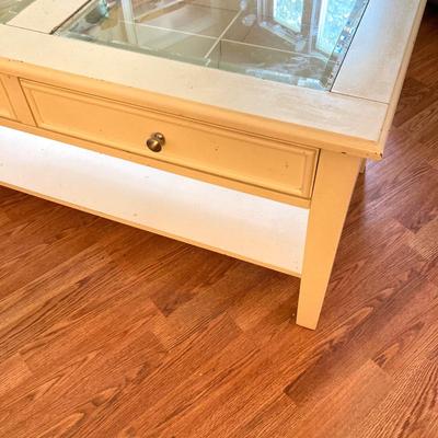 LOT 217: White 2-Drawer Glass Top Coffee Table