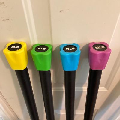 LOT 218: Fitness / Yoga Equipment Collection - Weighted Bars, Kettlebells, Philosophy Step Platform, Weighted Bar Workout Poster and More