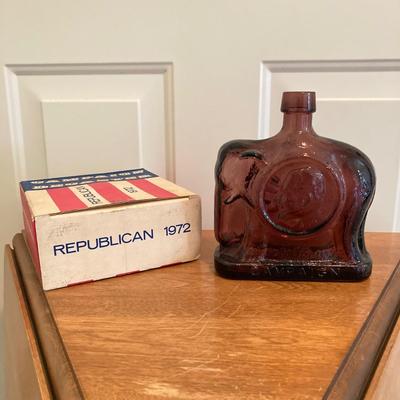 LOT 224: Tri-Fold Drop Leaf Wooden Accent Table with Wheaton Glass Martin Luther King and 1972 Republican Decorative Collectible Bottles