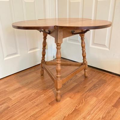 LOT 224: Tri-Fold Drop Leaf Wooden Accent Table with Wheaton Glass Martin Luther King and 1972 Republican Decorative Collectible Bottles