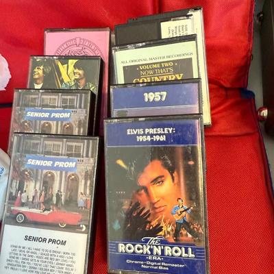 Stadium chair, cassettes, shot cups