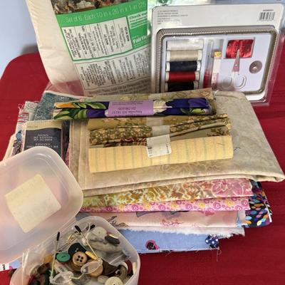 Quilting material, buttons, thread, plus