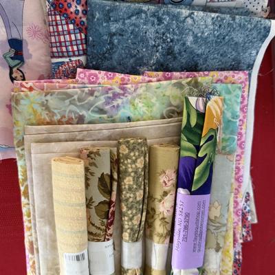 Quilting material, buttons, thread, plus