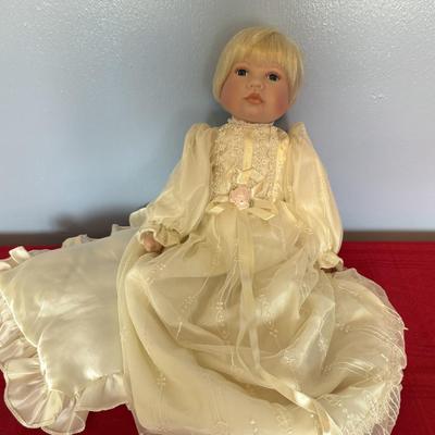 Doll with pillow