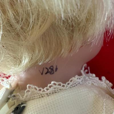 Doll with pillow
