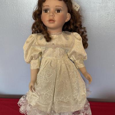 Brown eyed, brown haired doll
