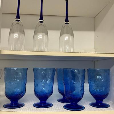 Sale Photo Thumbnail #1021: 7 blue stem champagne glasses, set of 5 blue goblets, 5 large dessert glasses, 5 toupe champagne glasses