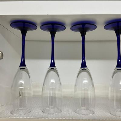 Sale Photo Thumbnail #1022: 7 blue stem champagne glasses, set of 5 blue goblets, 5 large dessert glasses, 5 toupe champagne glasses