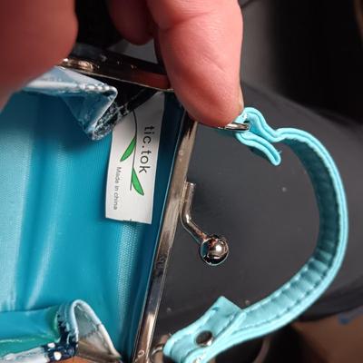 COMPACTS AND A VERY SMALL COIN PURSE