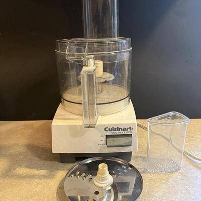 Crockpot, food processor and wooden cutting board