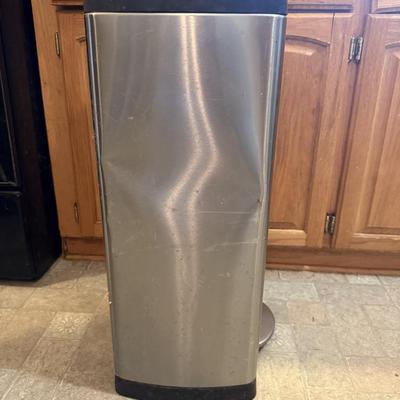 Folding Step Ladder and trash can, a little bit, dinged up on one side