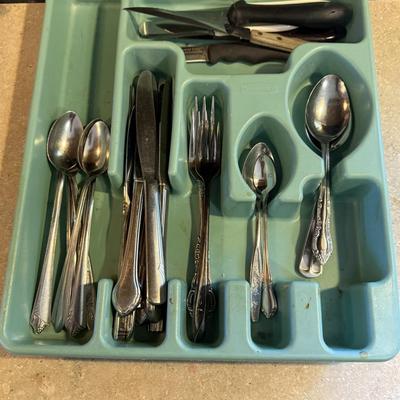 All miscellaneous spoons, knives, and forks and more