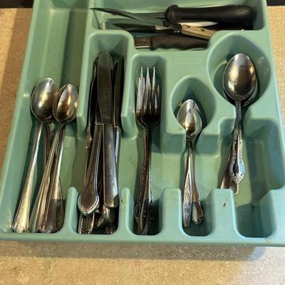 All miscellaneous spoons, knives, and forks and more