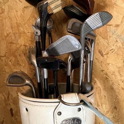 Golf clubs, bag, and more