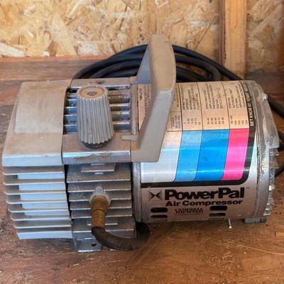 Air compressor & battery charger in working conditions