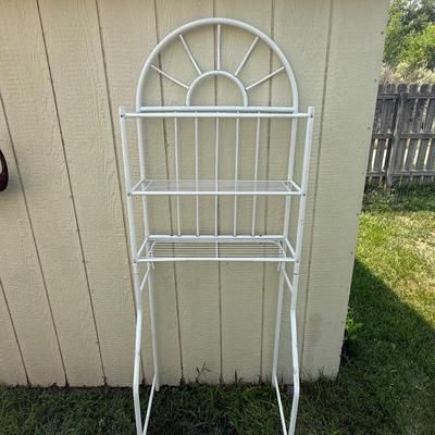 Three metal folding chairs and shelf for over the toilet